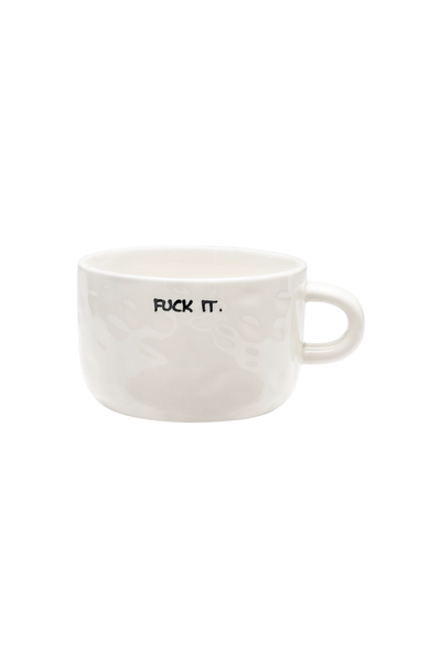 White mug with 'FUCK IT.' text on a white background
