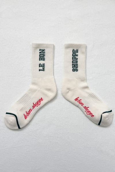 White socks with text on a light gray background